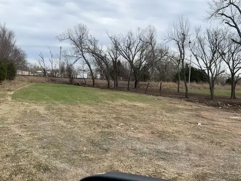 Cleared field with the tree line left standing
