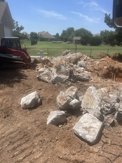Broken concrete staged for haul-off